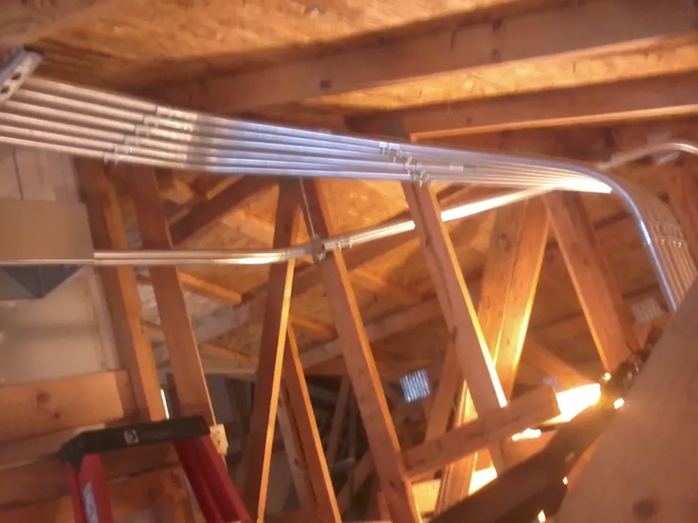 Residential cabin light fixtures and ceiling fan install - Work completed by Mills Electric Co.