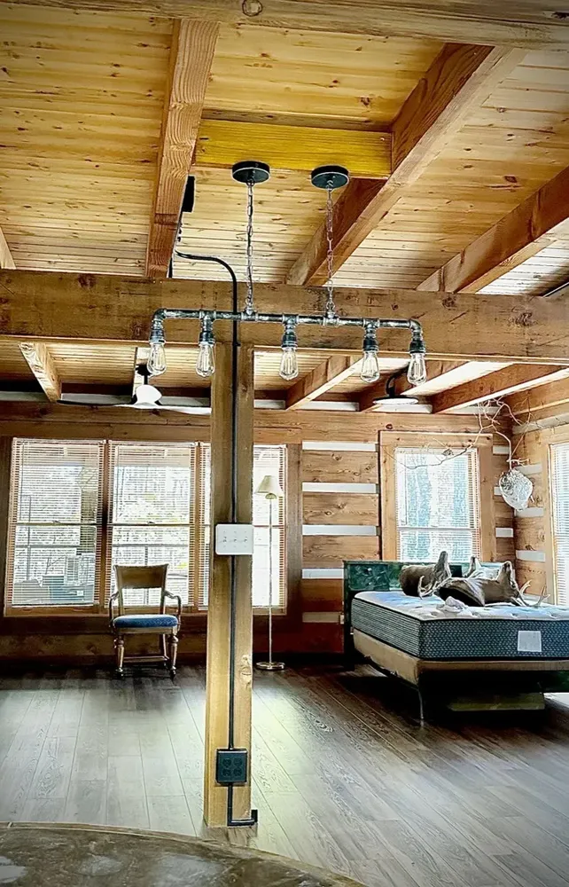 Residential cabin light fixtures and ceiling fan install - Work completed by Mills Electric Co.