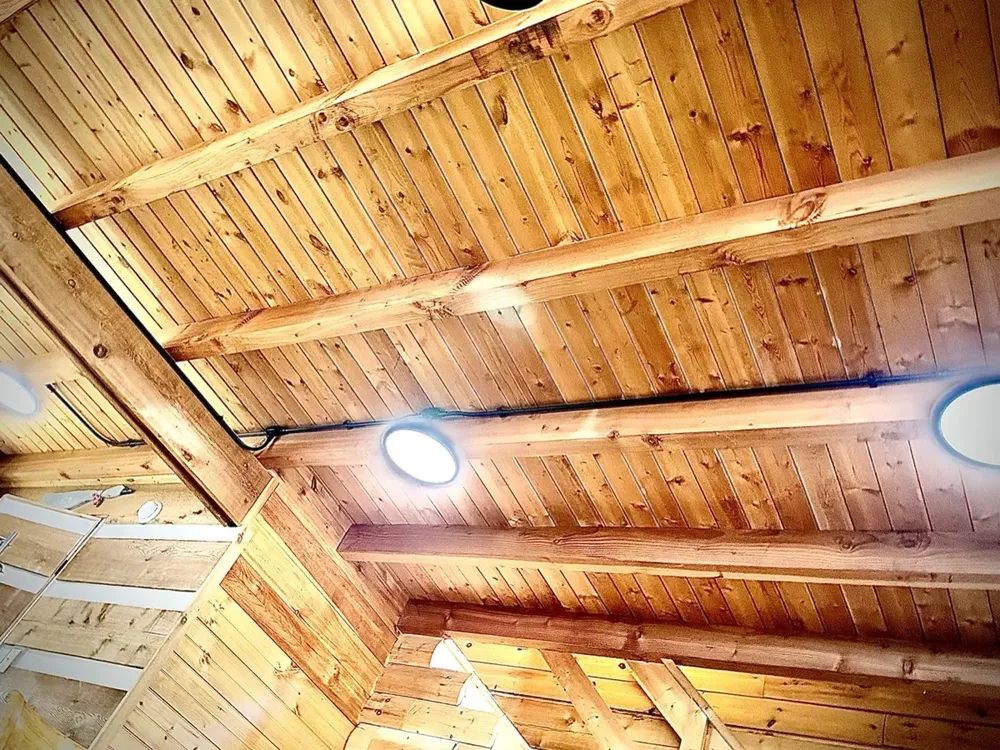Residential cabin light fixtures and ceiling fan install - Work completed by Mills Electric Co.