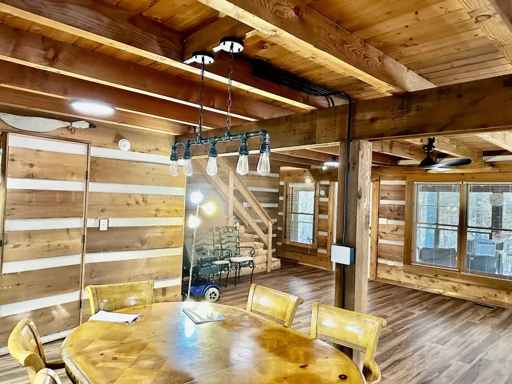 Residential cabin light fixtures and ceiling fan install - Work completed by Mills Electric Co.