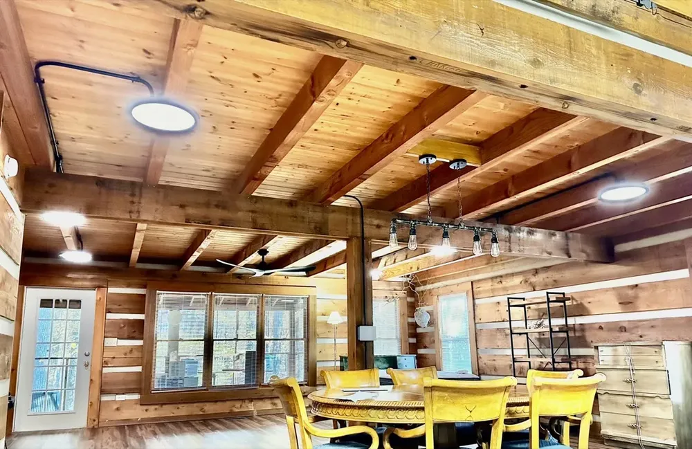 Residential cabin light fixtures and ceiling fan install - Work completed by Mills Electric Co.