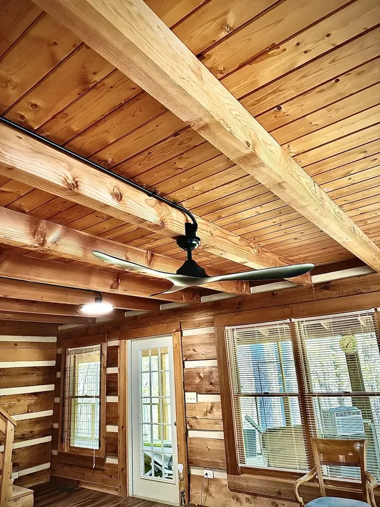 Residential cabin light fixtures and ceiling fan install - Work completed by Mills Electric Co.