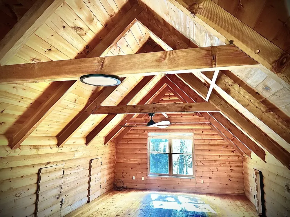 Residential cabin light fixtures and ceiling fan install - Work completed by Mills Electric Co.