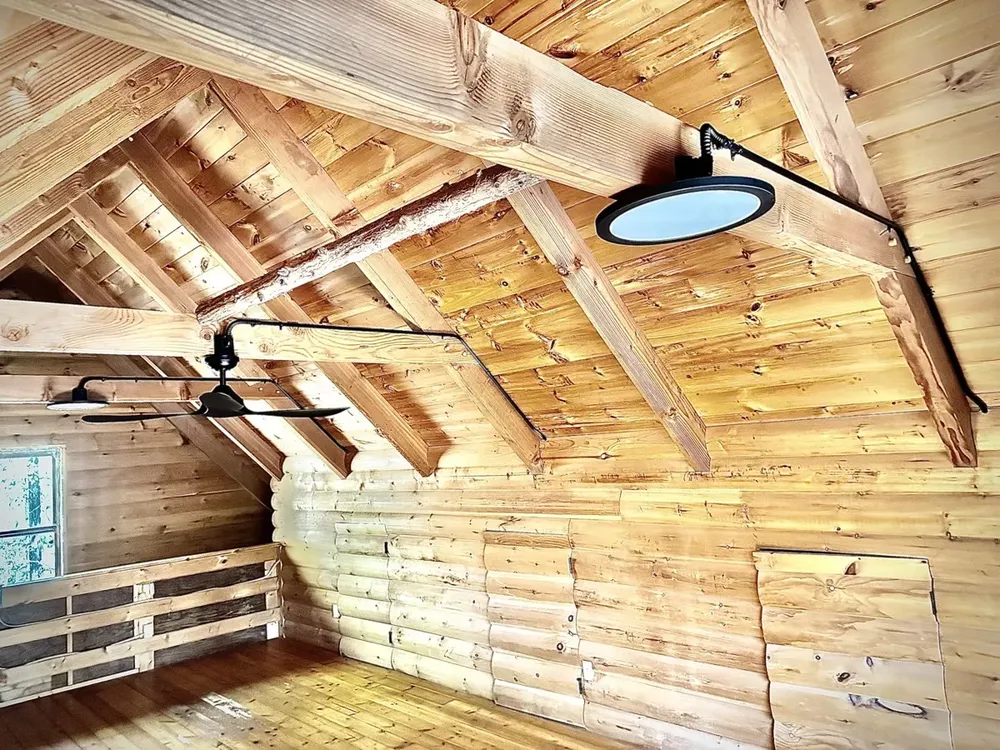Residential cabin light fixtures and ceiling fan install - Work completed by Mills Electric Co.