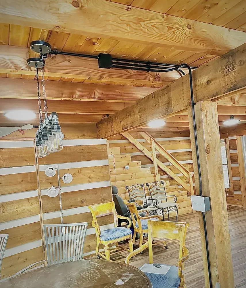 Residential cabin light fixtures and ceiling fan install - Work completed by Mills Electric Co.