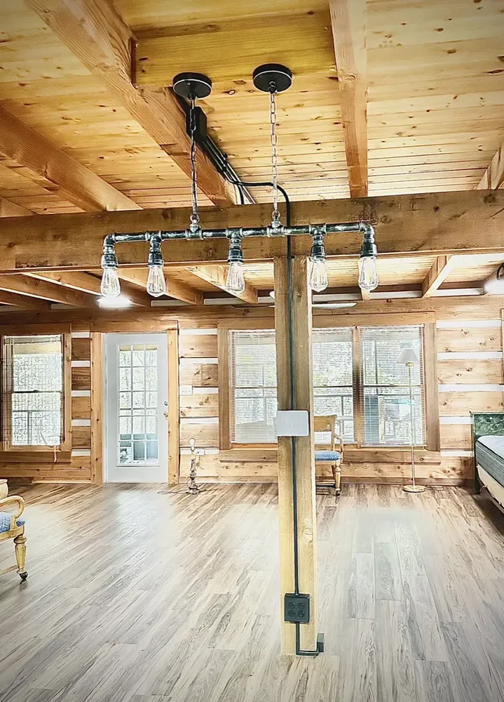 Residential cabin light fixtures and ceiling fan install - Work completed by Mills Electric Co.