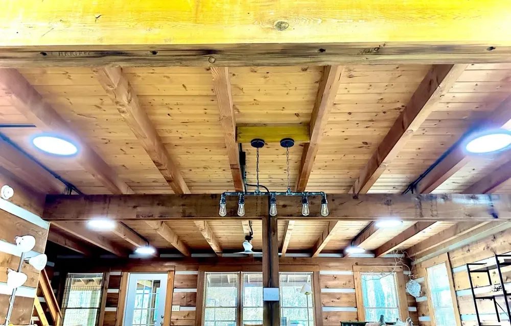 Residential cabin light fixtures and ceiling fan install - Work completed by Mills Electric Co.