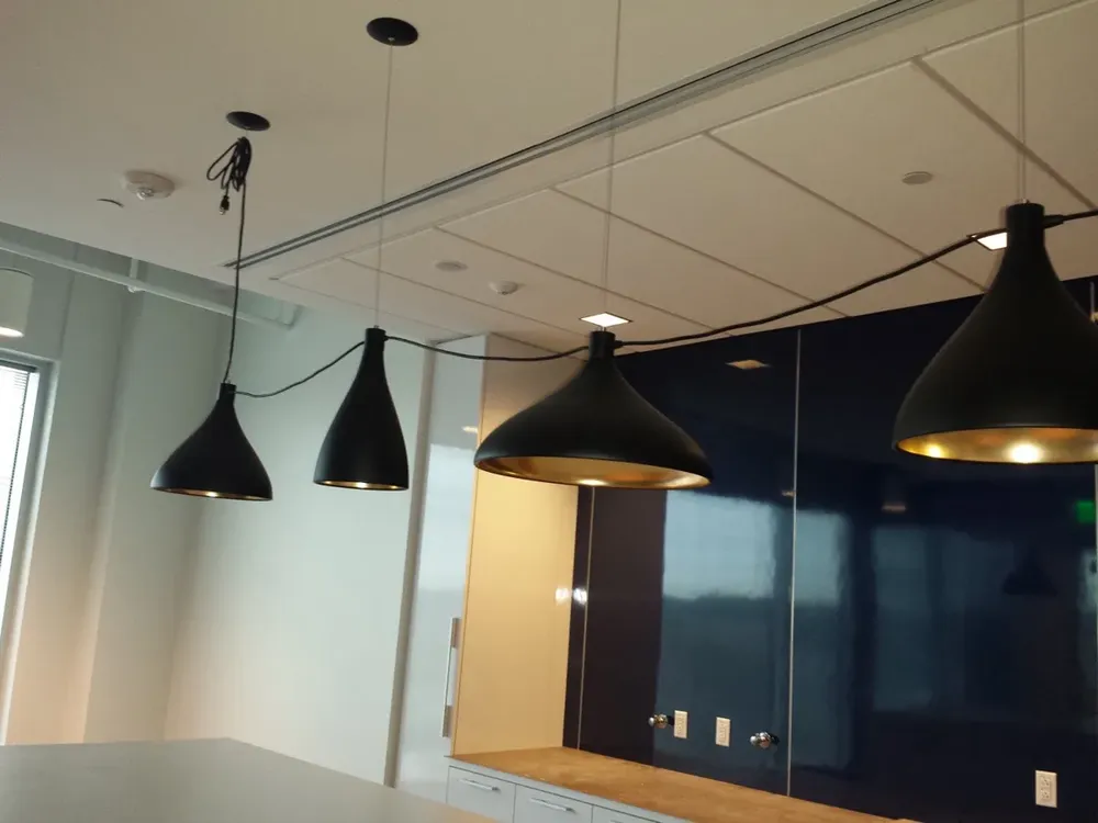 Interior office, retail, and warehouse commercial lighting updates - Work completed by Mills Electric Co.