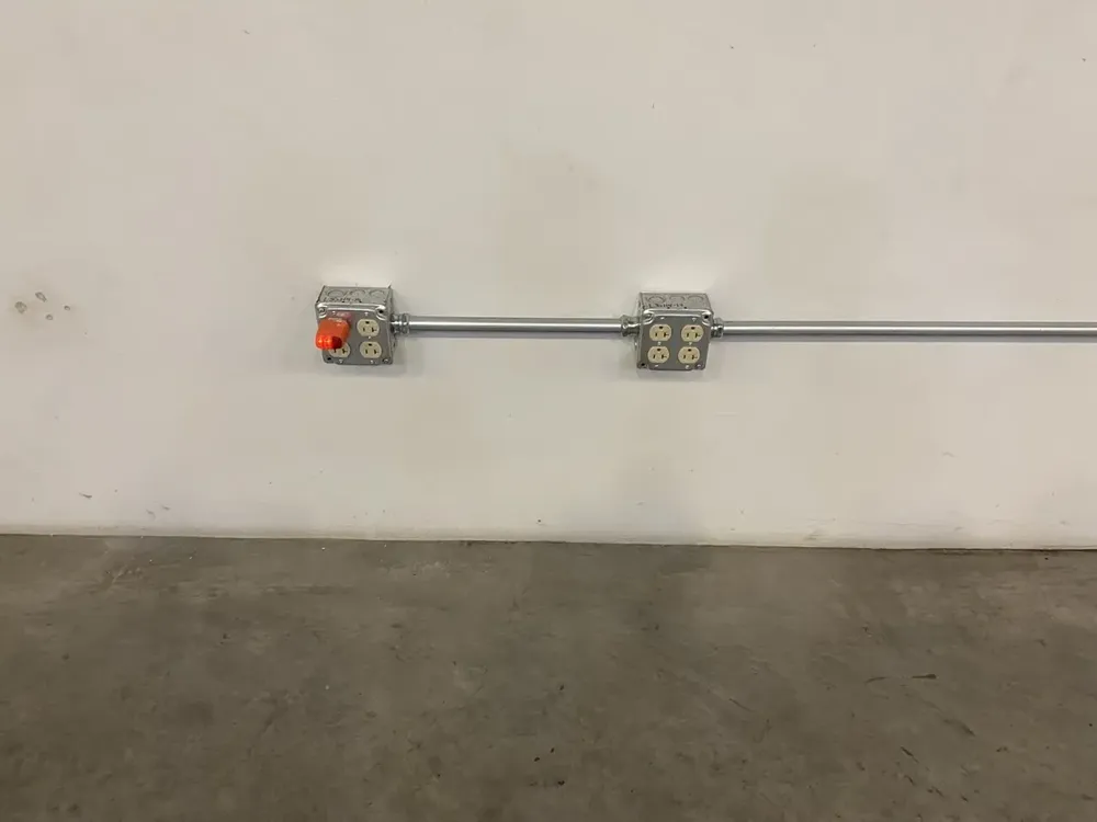 Industrial warehouse heavy-duty forklift fast-charging station setup - Work completed by Mills Electric Co.