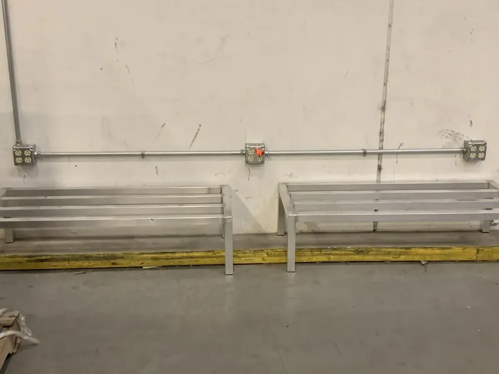 Industrial warehouse heavy-duty forklift fast-charging station setup - Work completed by Mills Electric Co.