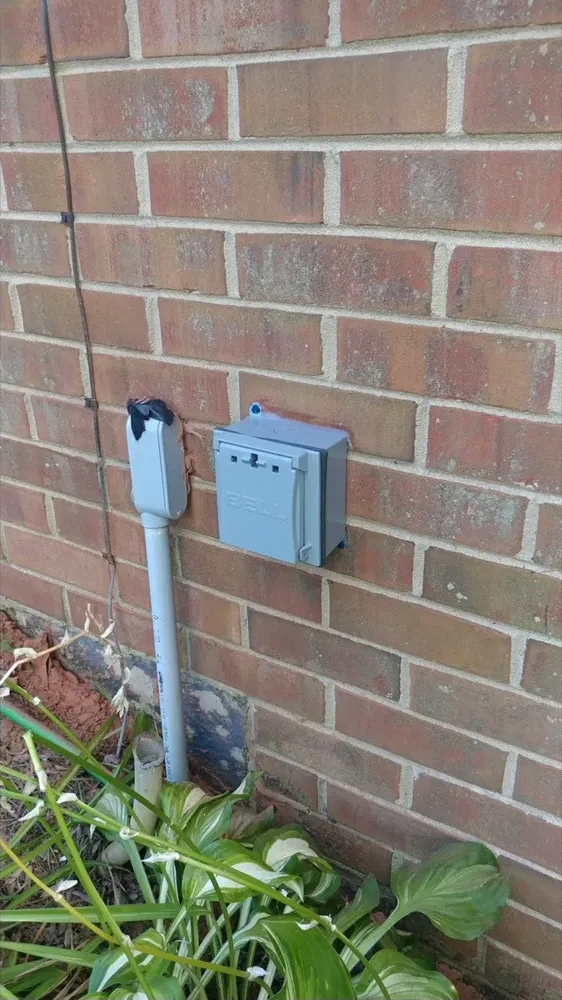 Whole-home standby generator plug and transfer switch wiring install - Work completed by Mills Electric Co.