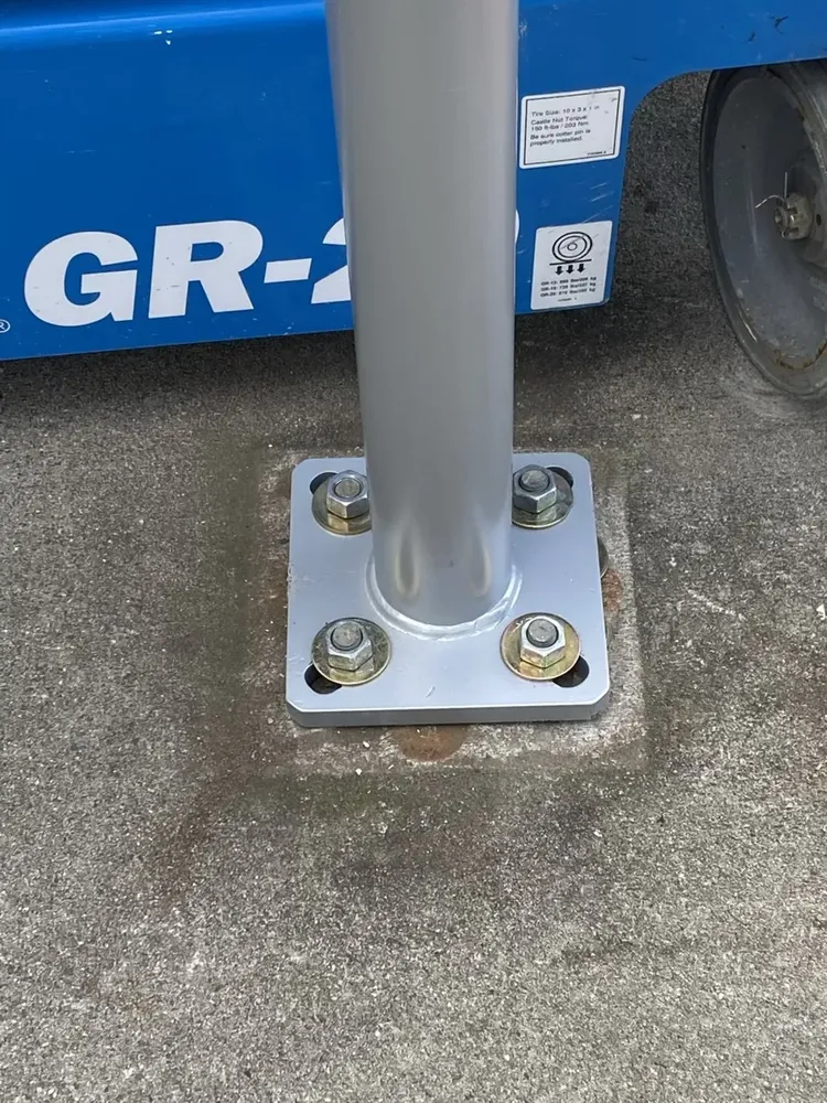 Commercial exterior parking lot lighting and structural poles repair - Work completed by Mills Electric Co.
