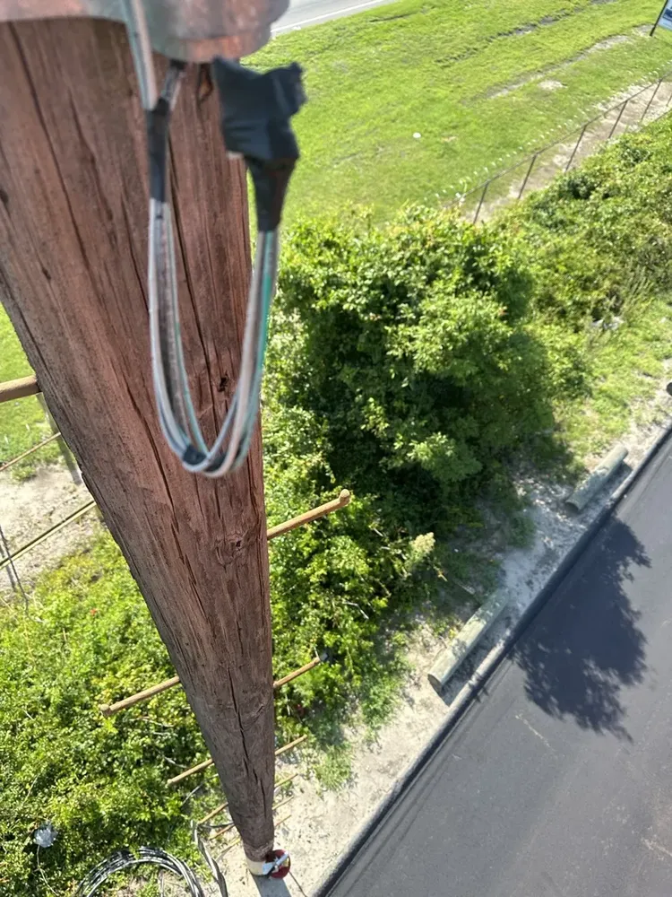 Commercial exterior parking lot lighting and structural poles repair - Work completed by Mills Electric Co.