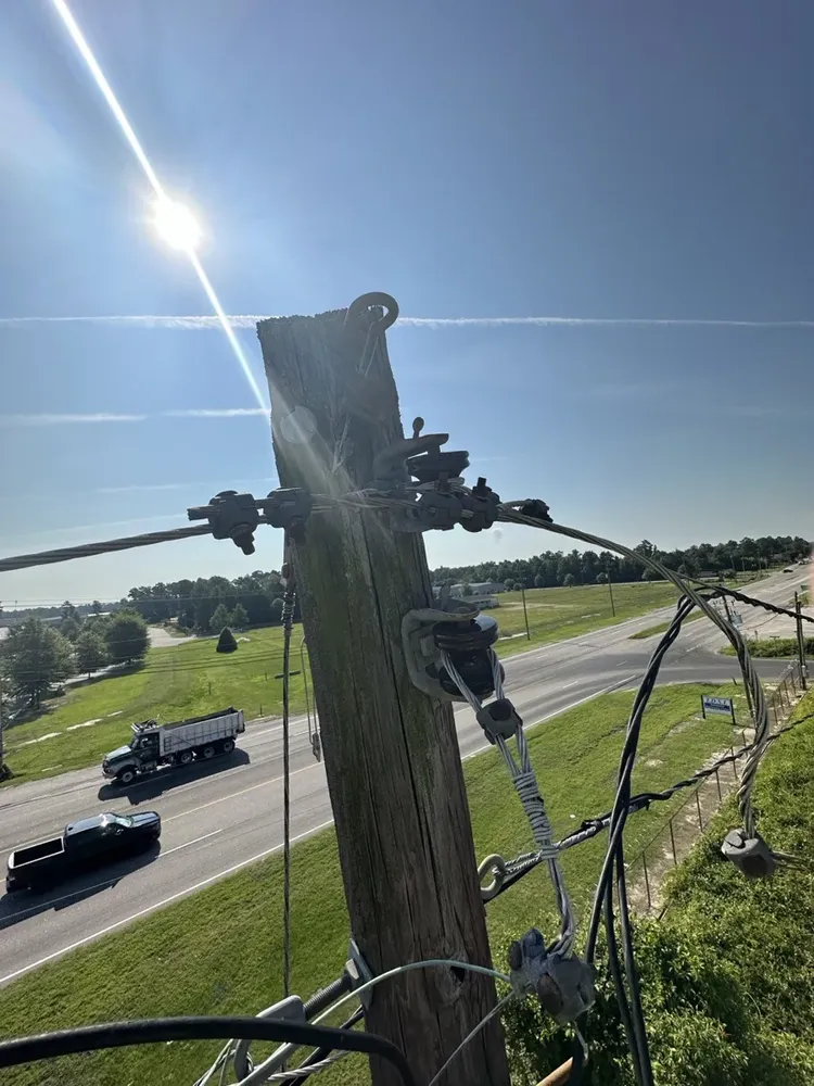 Commercial exterior parking lot lighting and structural poles repair - Work completed by Mills Electric Co.