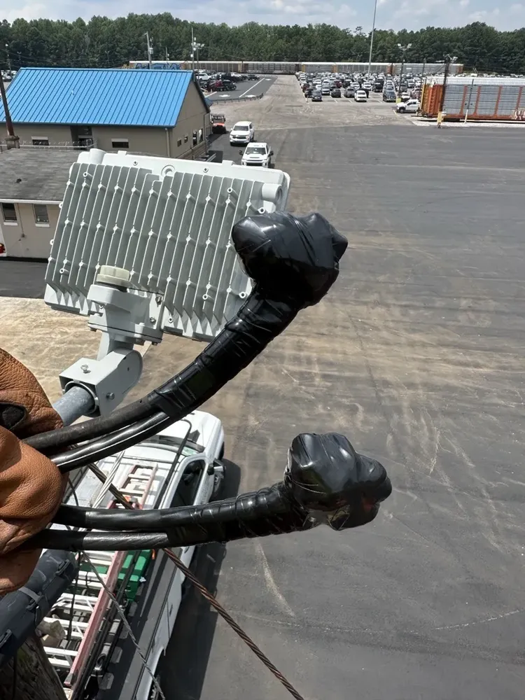 Commercial exterior parking lot lighting and structural poles repair - Work completed by Mills Electric Co.
