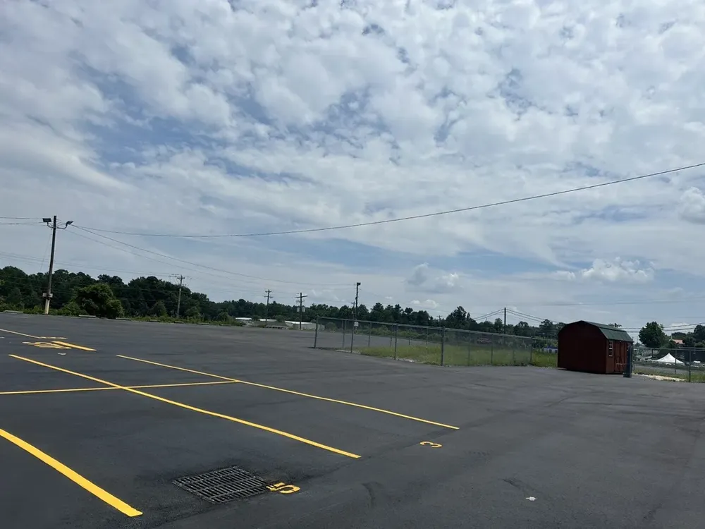 Commercial exterior parking lot lighting and structural poles repair - Work completed by Mills Electric Co.