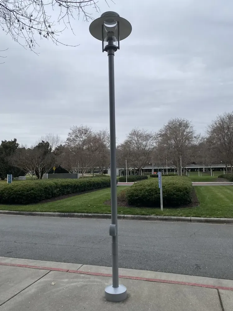Commercial exterior parking lot lighting and structural poles repair - Work completed by Mills Electric Co.