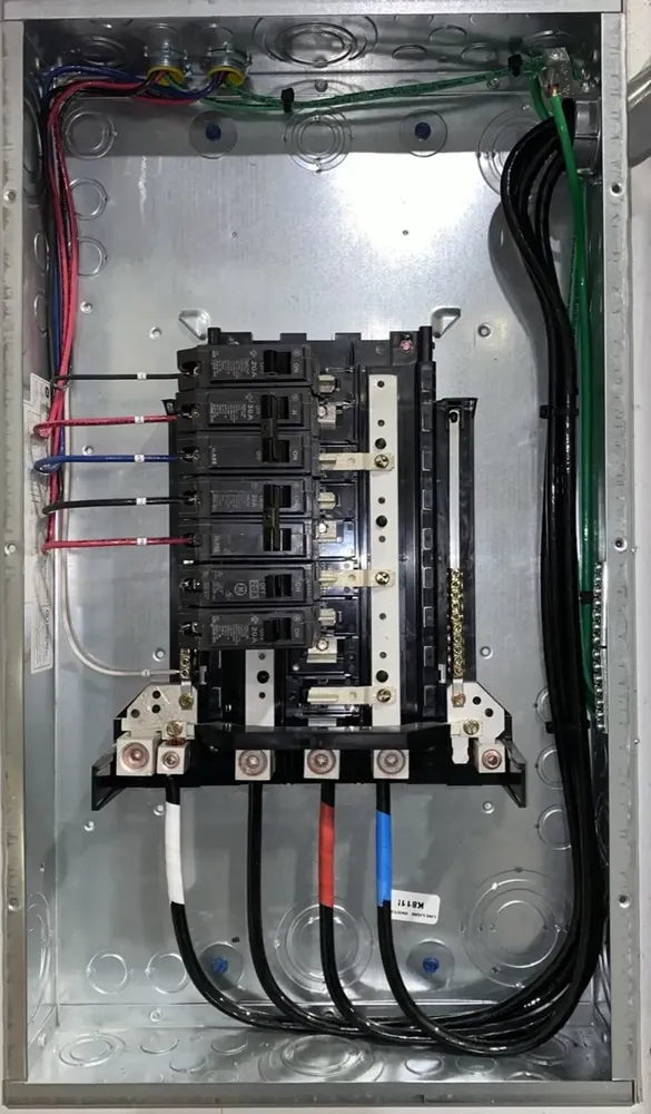 Warehouse subpanel expansion to feed large UPS battery power backups - Work completed by Mills Electric Co.