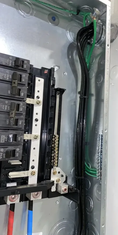 Warehouse subpanel expansion to feed large UPS battery power backups - Work completed by Mills Electric Co.