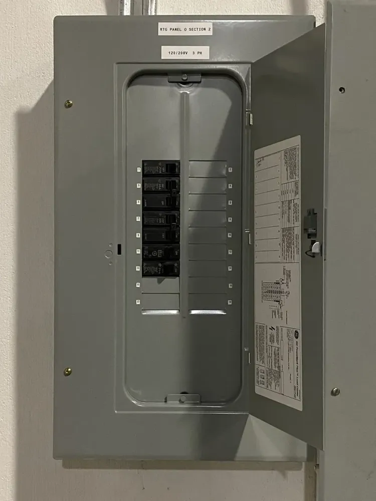 Warehouse subpanel expansion to feed large UPS battery power backups - Work completed by Mills Electric Co.