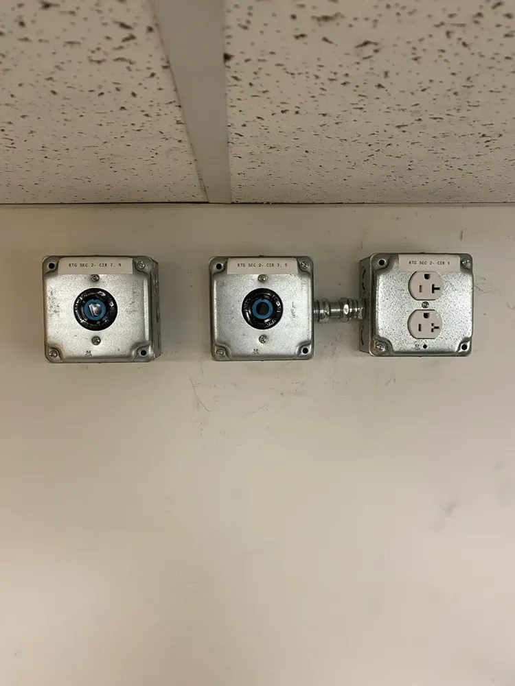 Warehouse subpanel expansion to feed large UPS battery power backups - Work completed by Mills Electric Co.