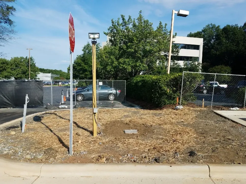 Commercial electrical underground trenches, feeders, and utility transformer connections - Work completed by Mills Electric Co.
