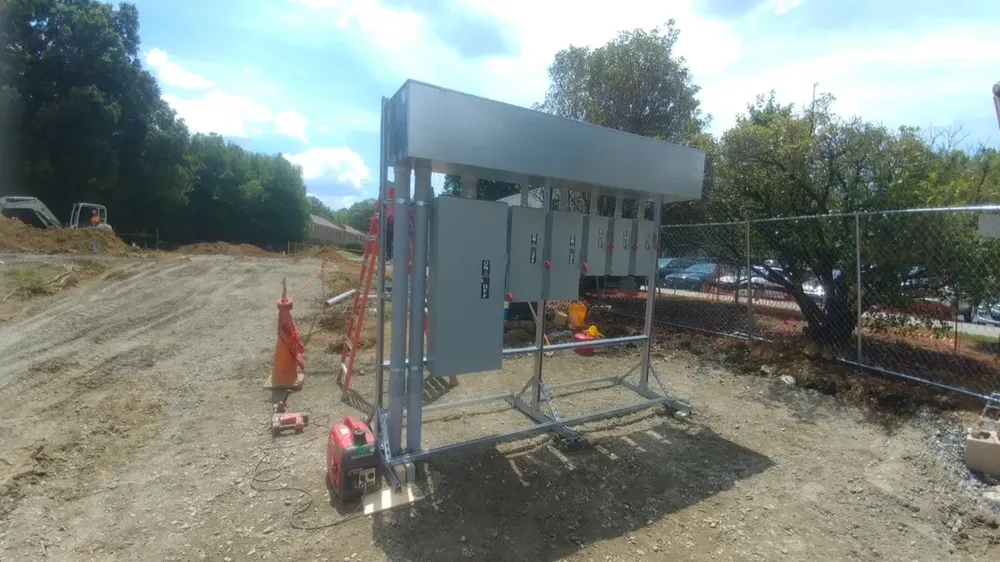 Commercial electrical underground trenches, feeders, and utility transformer connections - Work completed by Mills Electric Co.