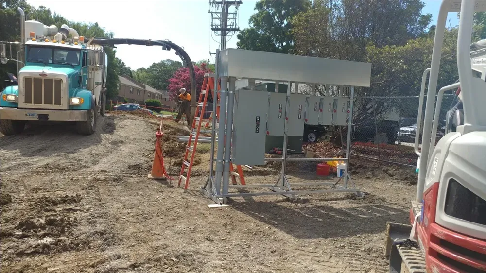 Commercial electrical underground trenches, feeders, and utility transformer connections - Work completed by Mills Electric Co.