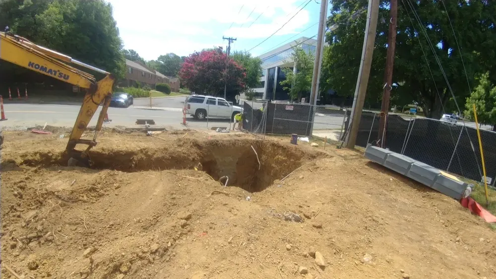 Commercial electrical underground trenches, feeders, and utility transformer connections - Work completed by Mills Electric Co.