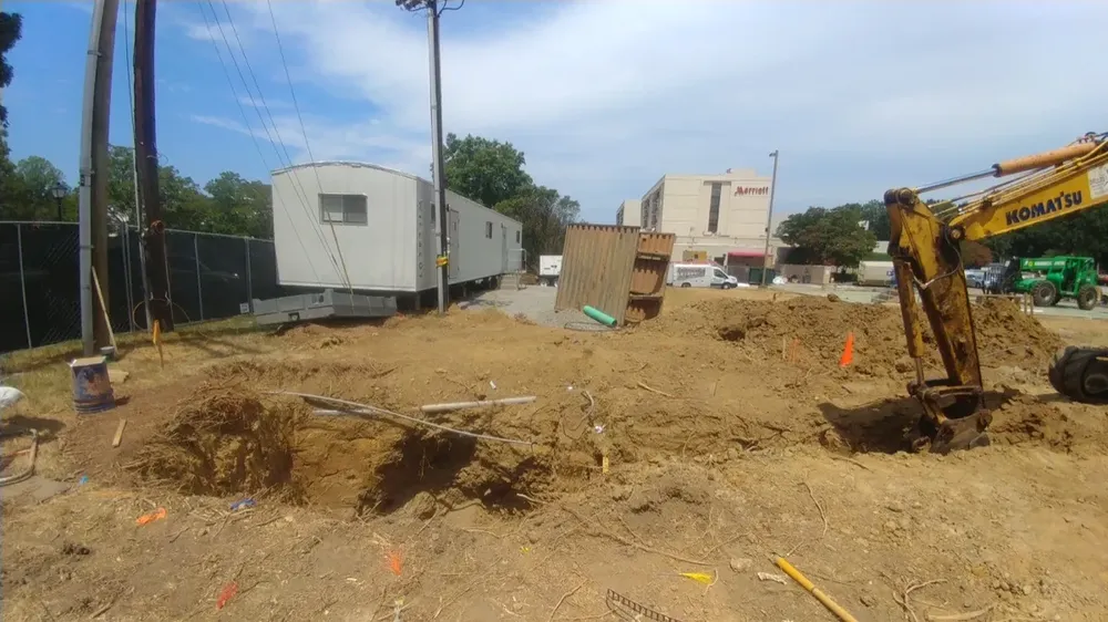 Commercial electrical underground trenches, feeders, and utility transformer connections - Work completed by Mills Electric Co.